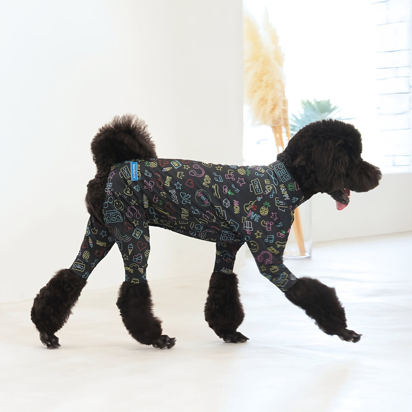 【新入荷】カラフルロンパース ブラックアート